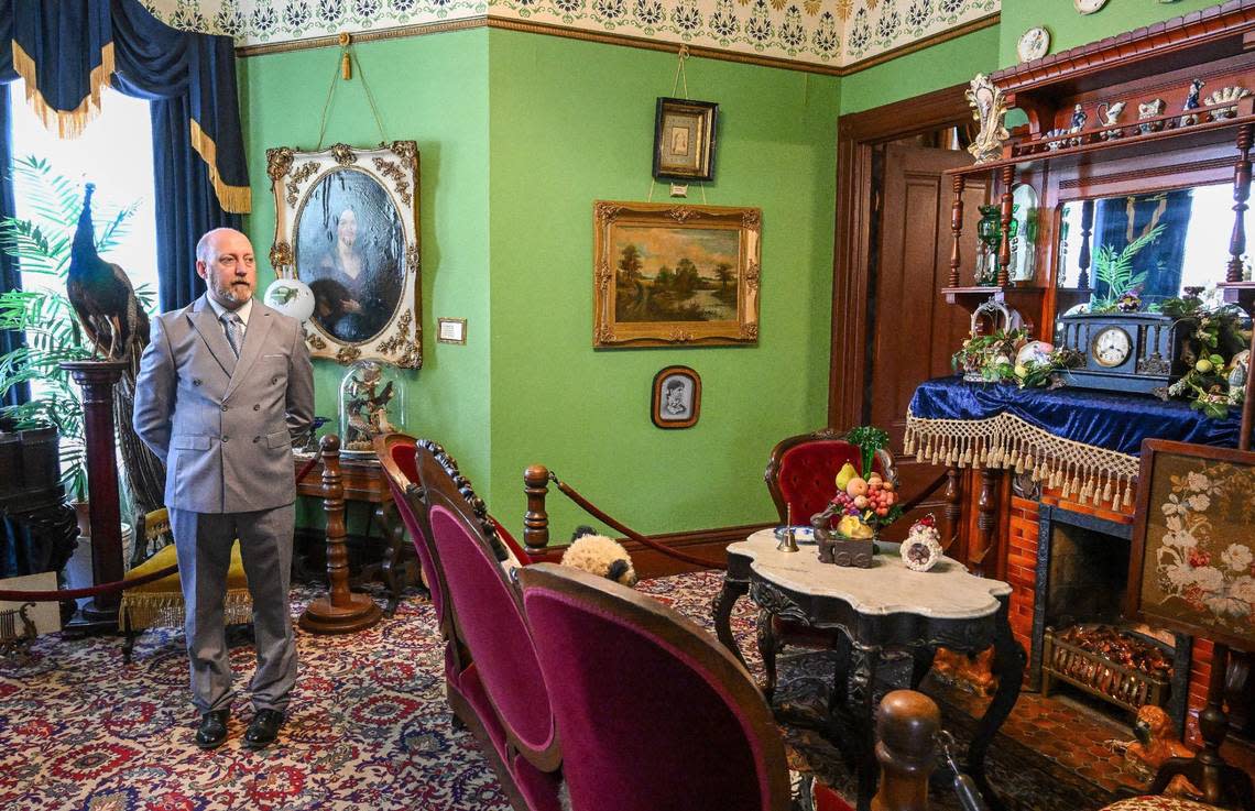 Quintin Hoskins, president and curator of the Meux Home Museum, stands in the front room of the Meux home, restored and furnished to its Victorian beginnings at its location on Tulare and R streets in downtown Fresno. CRAIG KOHLRUSS/ckohlruss@fresnobee.com