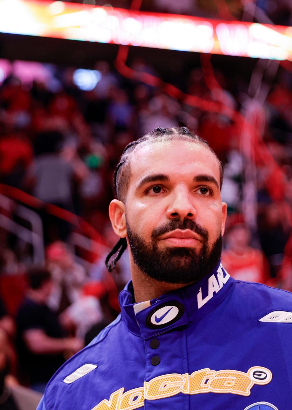 Drake attends a game between the Houston Rockets and the Cleveland Cavaliers at Toyota Center on March 16, 2024, in Houston, Texas.