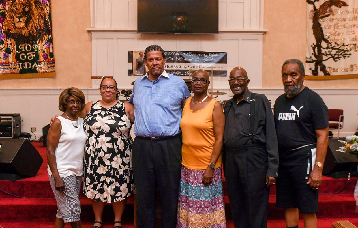 The Rev. Richard Jordan (third from left), senior pastor of Antioch Baptist Church in Canton, is being honored for 30 years of service. With him are some members of his leadership team (from left) Trustee CFO Betty Mabry, Elders Eva Graves and Beverly Williams, the Rev. William Wallace Luke, and Deacon Board Chairman Myron W. Clark.