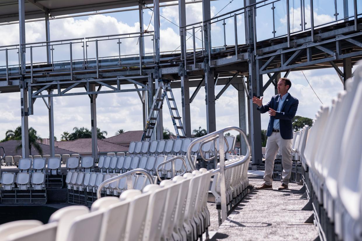 Andrew George, the new Executive Director of the Honda Classic, points out the changes made to the 17th tee grandstands ahead of the Honda Classic at PGA National on Thursday, February 2, 2023, in Palm Beach Gardens, FL. When guests arrive at the Bear Trap, they'll be greeted by an expanded concessions area and increased square footage on the second level.