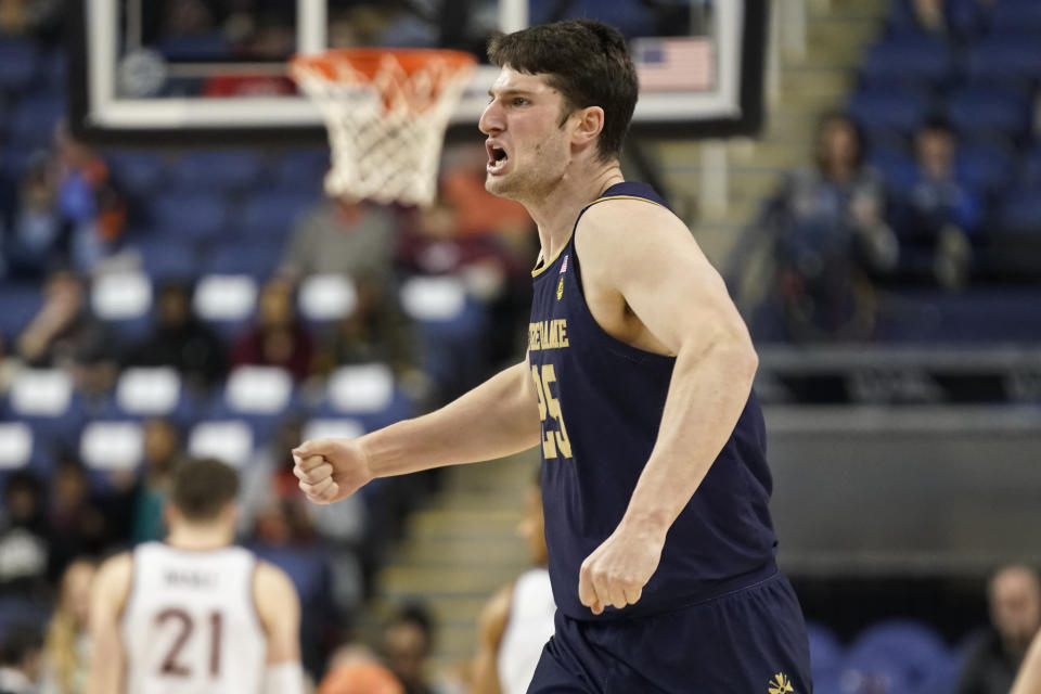 Notre Dame forward Matt Zona (25) reacts after making a 3-point basket against Virginia Tech during the first half of an NCAA college basketball game at the Atlantic Coast Conference men's tournament in Greensboro, N.C., Tuesday, March 7, 2023. (AP Photo/Chuck Burton)