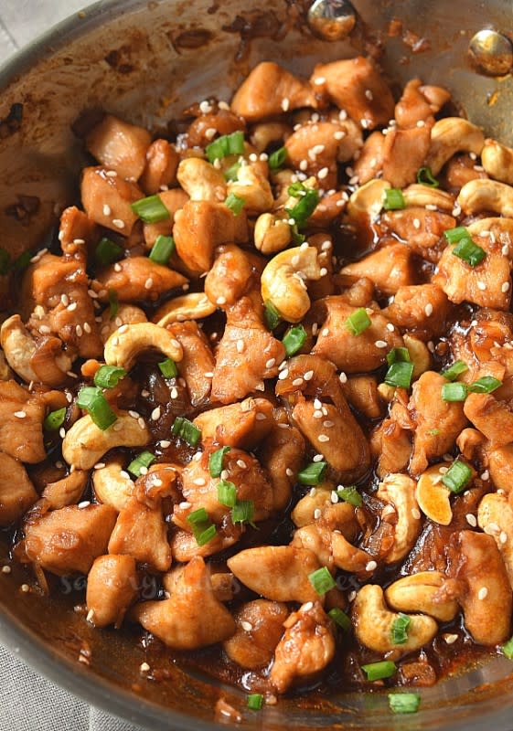 <p>Savory Bites</p><p>So easy to put together, this spicy cashew chicken stir fry has amazing flavor from the roasted cashews and veggies. It's ready in under 30 mins!</p><p><strong>Get the recipe: <a href="https://www.savorybitesrecipes.com/2019/06/cashew-chicken-stir-fry.html" rel="nofollow noopener" target="_blank" data-ylk="slk:Cashew Chicken Stir Fry;elm:context_link;itc:0;sec:content-canvas" class="link ">Cashew Chicken Stir Fry</a></strong></p><p><strong>Related: <a href="https://parade.com/1366944/felicialim/chicken-wraps/" rel="nofollow noopener" target="_blank" data-ylk="slk:Delicious Chicken Wrap Recipes;elm:context_link;itc:0;sec:content-canvas" class="link ">Delicious Chicken Wrap Recipes</a></strong></p>