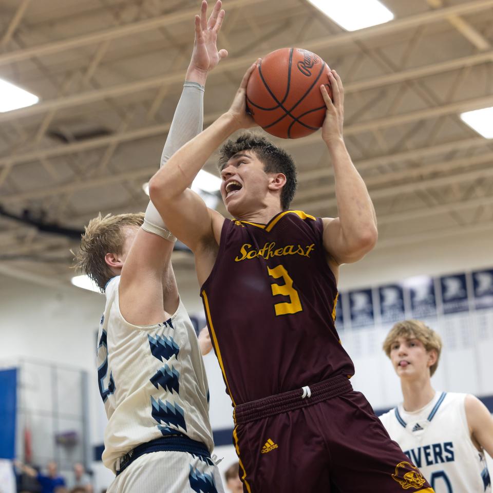 Southeast senior Garrett Sprutte, pictured driving to the basket at Rootstown, earned second team all-state honors.