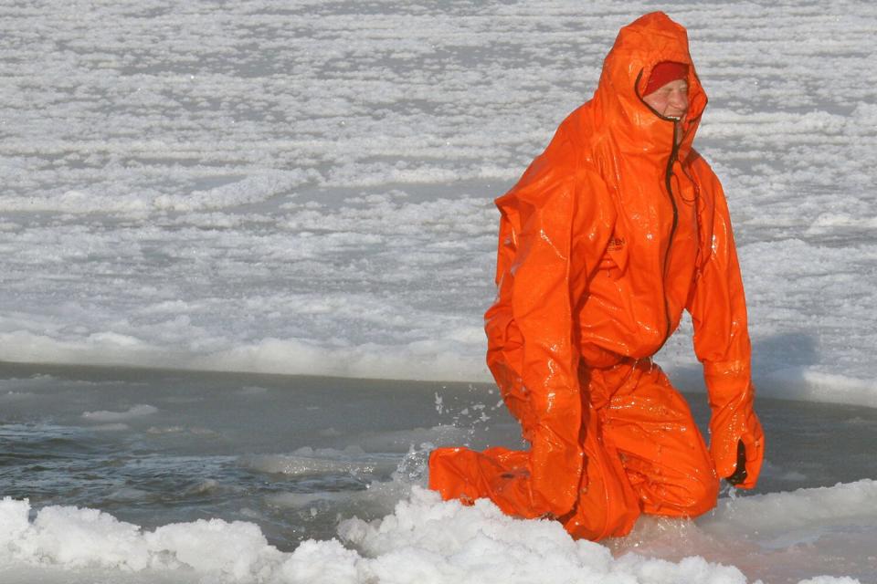 Prince Harry, part of the Walking with the Wounded expedition team, tries out an immersion suit on the island of Spitsbergen