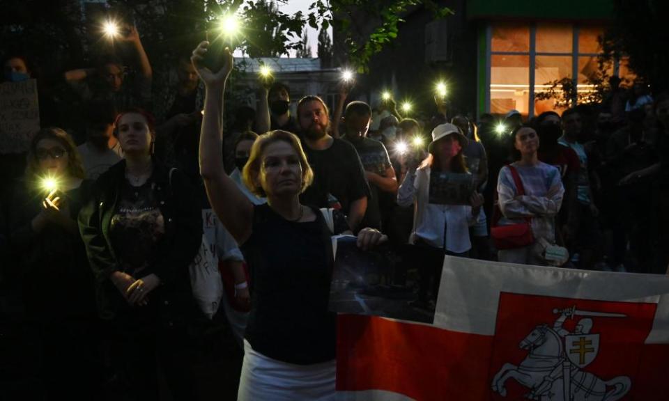 Members of the Belarus diaspora rally in solidarity outside the embassy in Kiev.