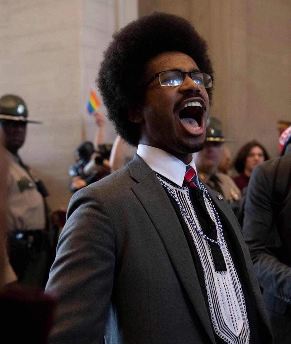 Rep. Justin Pearson, D- Memphis yells to the crowd “Whose house? Our house!” following the first day of legislative session at Tennessee State Capitol in Nashville, Tenn., Tuesday, Jan. 9, 2024.