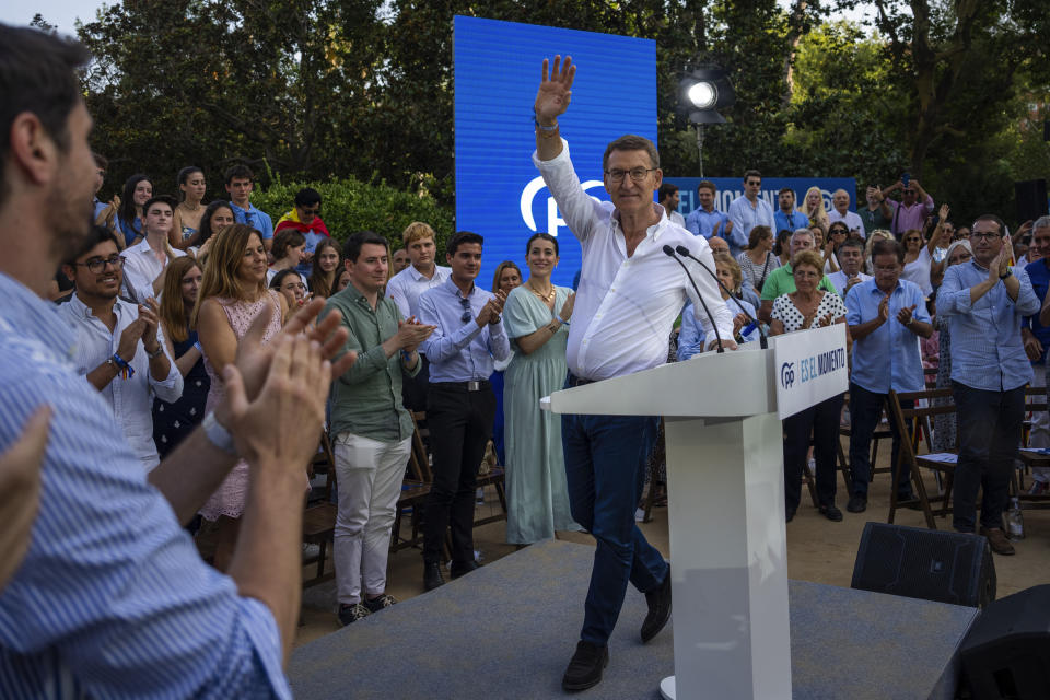 FILE, Popular Party candidate Nunez Feijoo arrives at the stage to take part at a campaigning meeting in Barcelona, Spain, Monday, July 17, 2023. The leader of Spain’s conservatives will have his opportunity to form a new government this week in what has been preordained as a lost cause given his lack of support in the Parliament. Alberto Núñez Feijóo's Popular Party won the most seats from inconclusive elections in July but fell well short of a majority. (AP Photo/Emilio Morenatti, File)