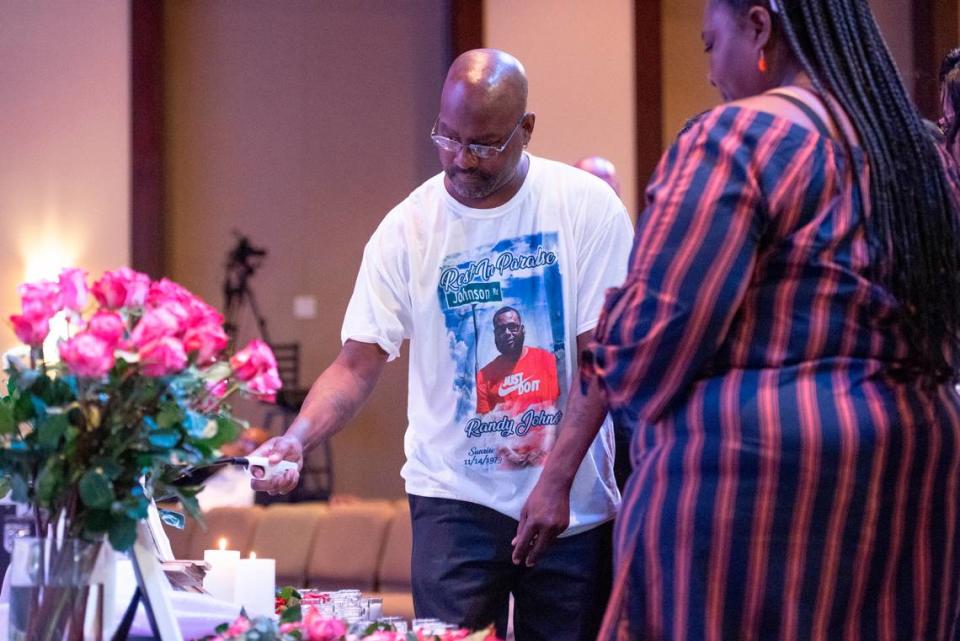 Family members of Randy Johnson light candles around a photo of him during a candlelight ceremony as a part of National Crime Victims’ Rights Week at First Baptist Church of Gulfport on Tuesday, April 23, 2024. Randy Johnson, 41, was shot and killed on Sept. 18, 2021 at the Golden Nugget Casino in Biloxi.