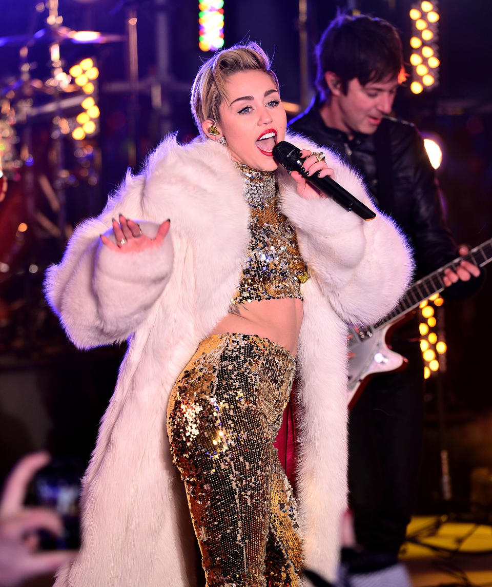 Miley performing onstage