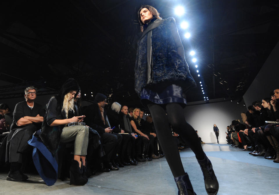 The Helmut Lang Fall 2013 collection is modeled during Fashion Week, Friday, Feb. 8, 2013, in New York. (AP Photo/Louis Lanzano)