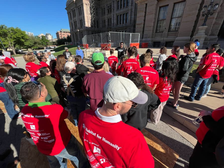 Multiple volunteers came together on Thursday for Habitat for Humanity Texas’ Day at the Dome Capitol Build to help build a home for a Texas family in need | Todd Bailey/KXAN News