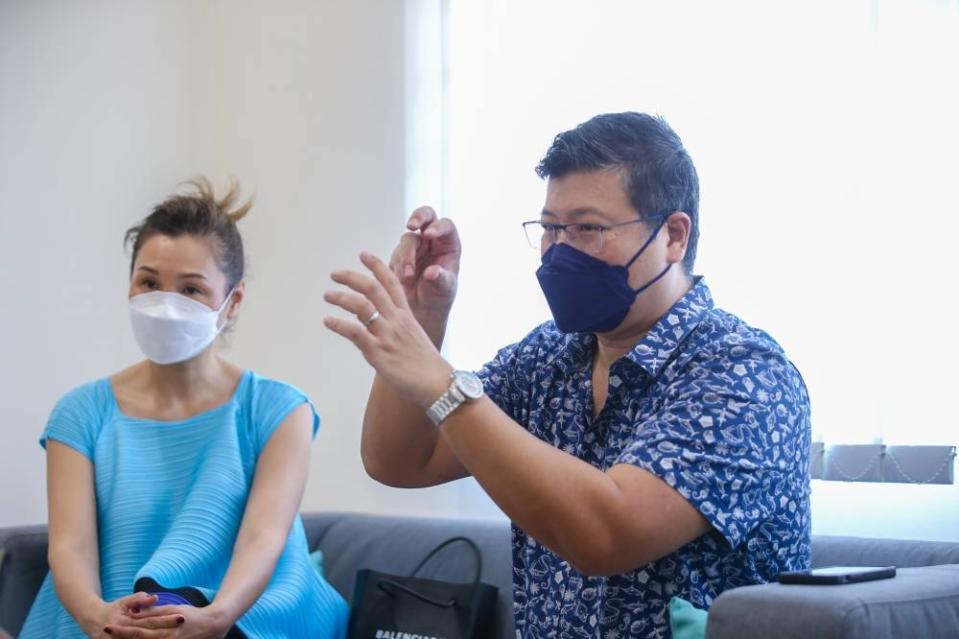 Tang (right) with his wife Caroline Zhang say the process of coding in itself helps teach children soft skills such as problem-solving, communication, and resilience.