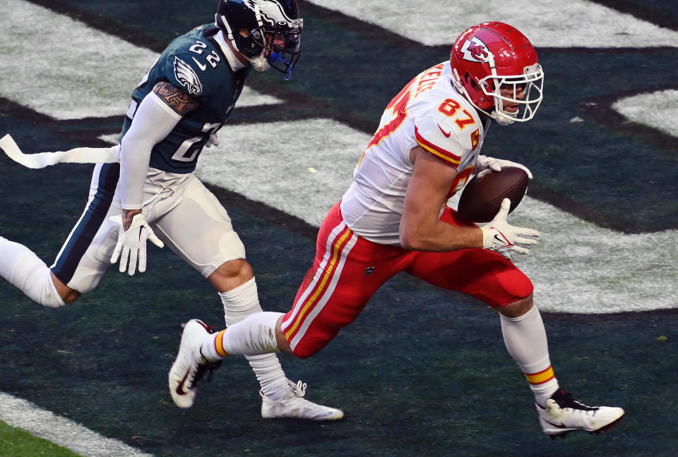 Travis Kelce #87 of the Kansas City Chiefs catches a touchdown pass against the Philadelphia Eagles during the first half in Super Bowl LVII at State Farm Stadium on Feb. 12, 2023 in Glendale, Arizona. / Credit: Focus On Sport / Getty Images