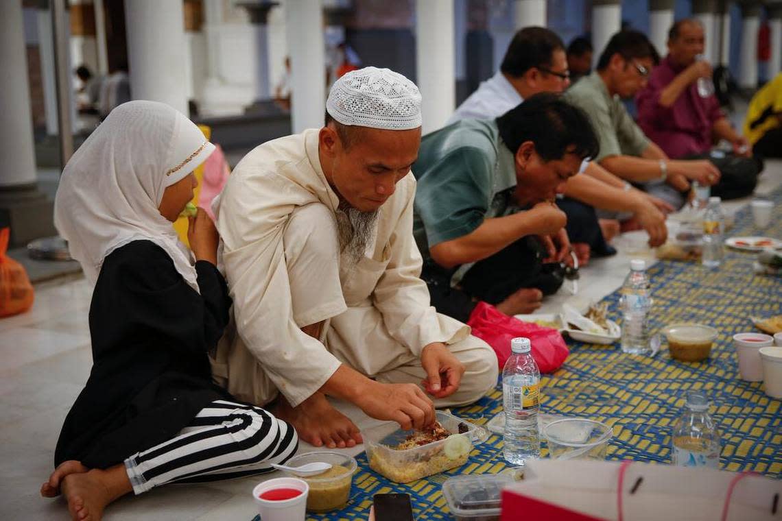 
A Muslim family in Malaysia breaks their fast Thursday on the first day of the Islamic holy month of Ramadan.
