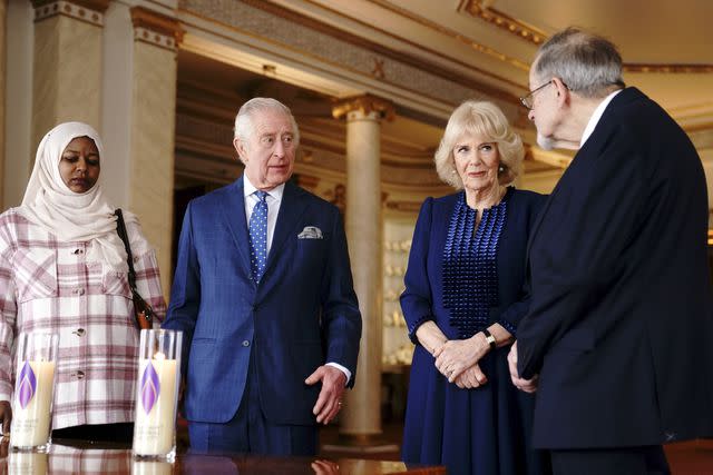 VICTORIA JONES/POOL/AFP via Getty King Charles and Queen Camilla welcome genocide survivors to Buckingham Palace for Holocaust Remembrance Day 2023