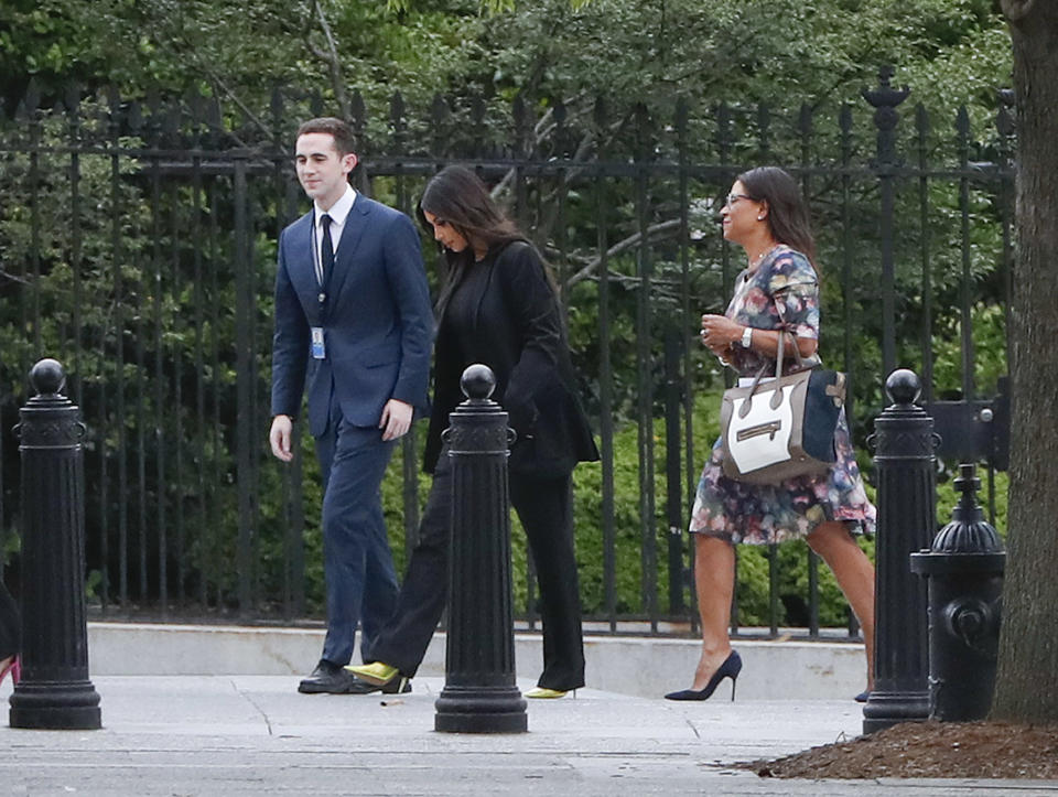 Kim Kardashian and her attorney Shawn Holley, right, arrive at the security entrance of the White House in Washington, D.C., on May 30, 2018. (Photo: Pablo Martinez Monsivais/AP)