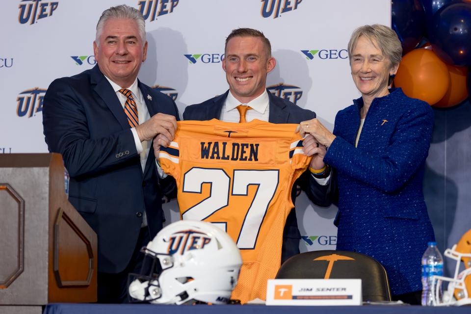 UTEP Athletic Director Jim Senter and UTEP President Heather Wilson present Scotty Walden with a jersey as he was introduced as the new UTEP head football coach on Wednesday, Dec. 6, 2023, at a press conference at the Larry K. Durham Sports Center on campus.