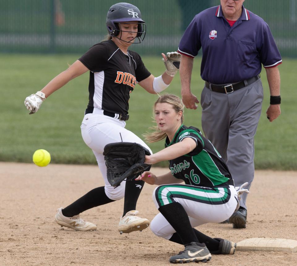 Marlington's Ava Collins makes it back to second base to beat the tag of West Branch's Baylee Waugaman in the fourth inning at the Jefferson Area fields Tuesday, May, 16, 2023.