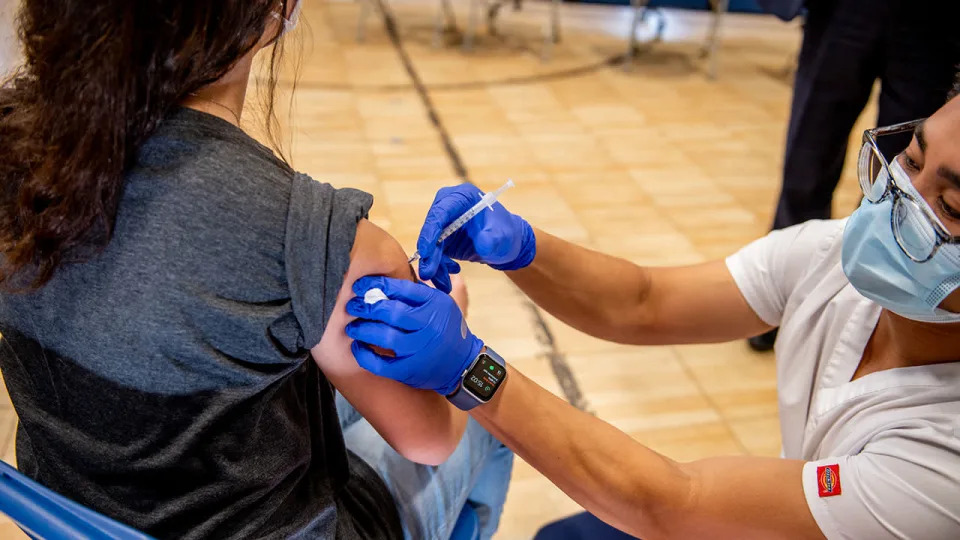 A healthcare worker administers a Covid-19 vaccine to a teenager at a vaccination site at a church in Long Beach, New York, on Thursday, May 13, 2021. As the U.S. launches a campaign to vaccinate teens against Covid-19, public-health officials are leaping into action on a new strategy designed to involve family doctors, pediatricians and schools. Photographer: Johnny Milano/Bloomberg via Getty Images <span class="copyright">Johnny Milano/Bloomberg via Getty Images</span>