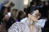 A model wears a creation for the Elie Saab Haute Couture Spring/Summer 2020 fashion collection presented Wednesday Jan. 22, 2020 in Paris. (AP Photo/Michel Euler)