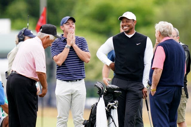 Rory McIlroy, second left, and Tiger Woods, third left, are part of a seven-member transaction subcommittee created by the PGA tour to negotiate with the Public Investment Fund (PIF), which bankrolls the LIV Golf League (Jane Barlow/PA)