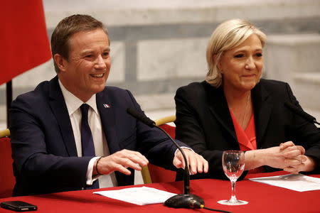 Marine Le Pen French National Front (FN) political party leader and candidate for French 2017 presidential election and Debout La France group former candidate Nicolas Dupont-Aignan attend a news conference in Paris, France, April 29, 2017. REUTERS/Charles Platiau