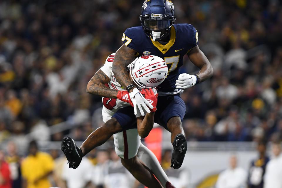Toledo Rockets cornerback Quinyon Mitchell breaks up a pass intended for Miami receiver Gage Larvadain in the third quarter at Ford Field, Dec. 2, 2023 in Detroit.