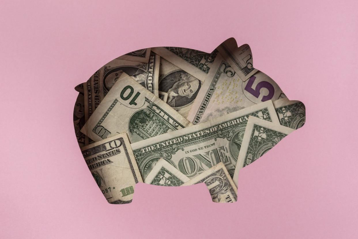 An image of money in a piggy bank.