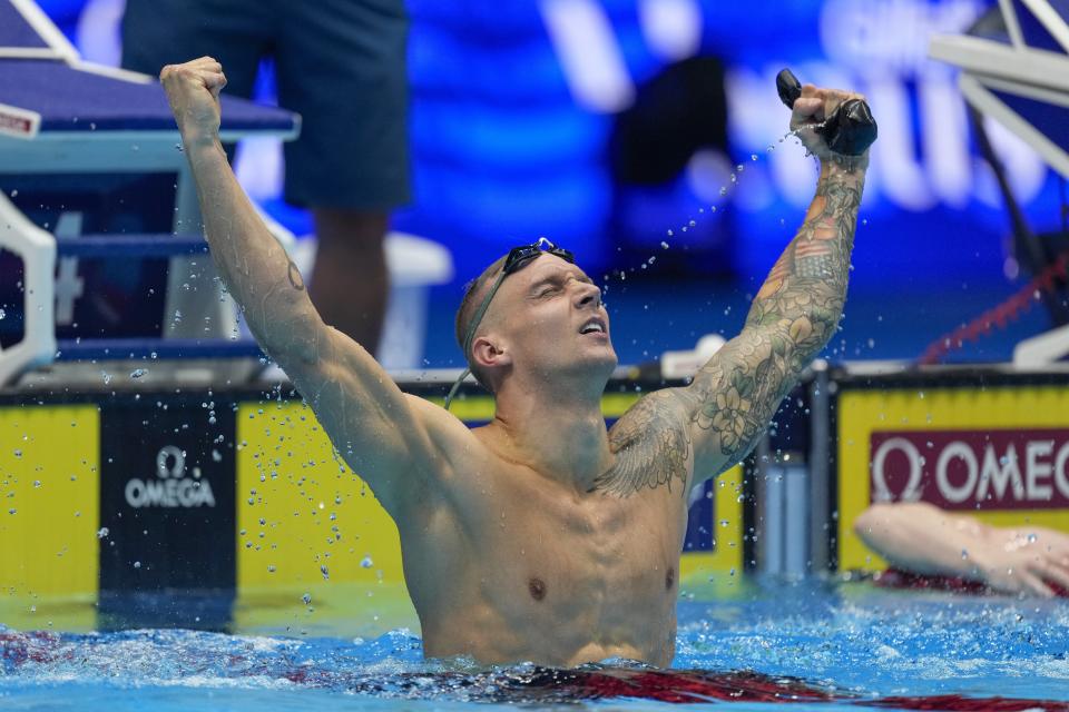 Caeleb Dressel reacts after winning the Men's 100 butterfly finals Saturday, June 22, 2024, at the US Swimming Olympic Trials in Indianapolis. (AP Photo/Michael Conroy)