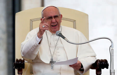 Pope Francis speaks as he leads the general audience in Saint Peter's Square at the Vatican October 26, 2016. REUTERS/Max Rossi/File Photo