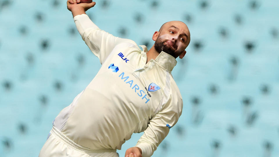 Nathan Lyon, pictured here in action for NSW against Victoria in the Sheffield Shield. 