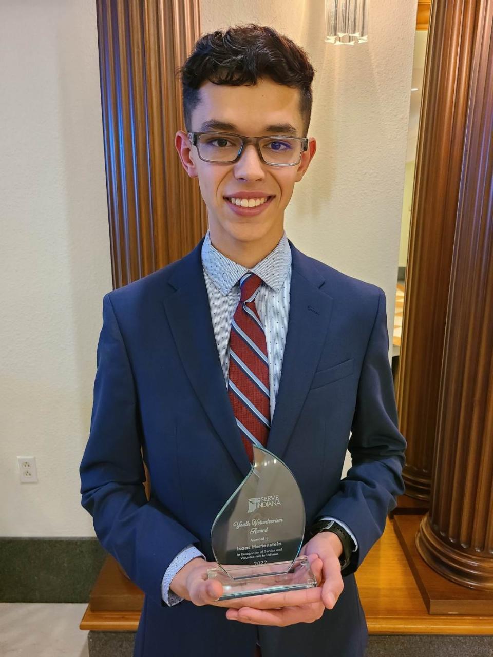 Isaac Hertenstein, the founder of Students Teaching Finance, received the 2022 Indiana Youth Volunteer of the Year award during the Serve Indiana Awards for Excellence on Nov. 3, 2022 at the Indiana Historical Society.