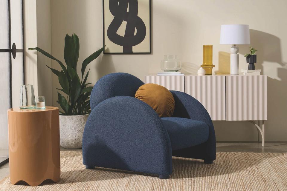 <p>If you want to move away from neutrals, you'll be pleased to know that this accent chair is also available in navy blue. It's very chic.</p><p><strong>£379</strong></p><p><a class="link " href="https://www.made.com/2lg-accent-armchair-dark-navy-boucle" rel="nofollow noopener" target="_blank" data-ylk="slk:SHOP NOW;elm:context_link;itc:0;sec:content-canvas">SHOP NOW</a></p>