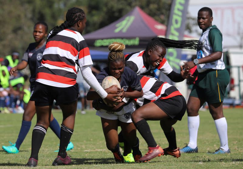 In Zimbabwe, female rugby team seeks to keep girls off the streets