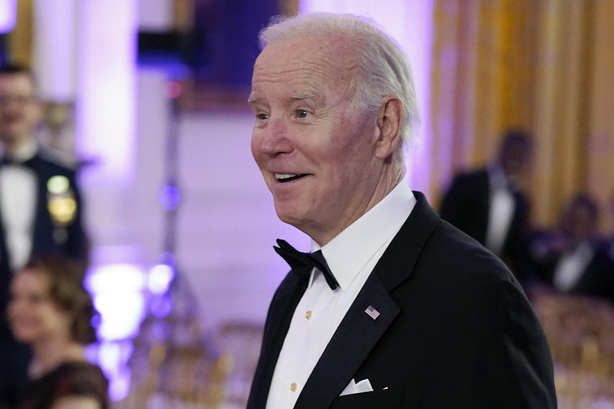 President Joe Biden arrives in the East Room of the White House following a dinner reception for the National Governors Association members, Saturday, Feb. 11, 2023, in Washington. (AP Photo/Manuel Balce Ceneta)