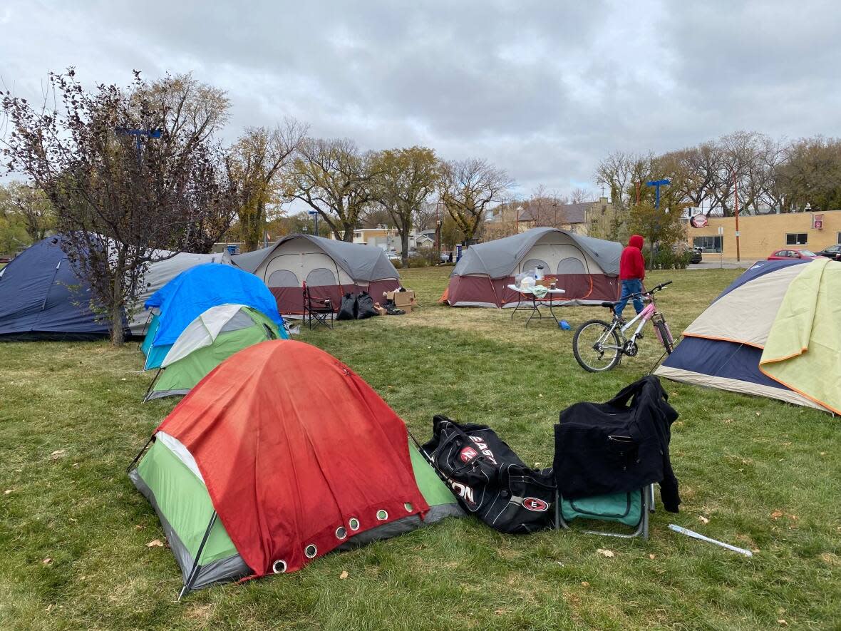 A resident at Camp Marjorie was found in medical distress during a routine wellness check on Tuesday morning, camp organizers say. The person wasn't able to be resuscitated. (Raphaële Frigon/Radio-Canada - image credit)