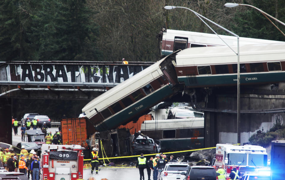 At least six people were killed when a passenger train car plunged from the bridge.