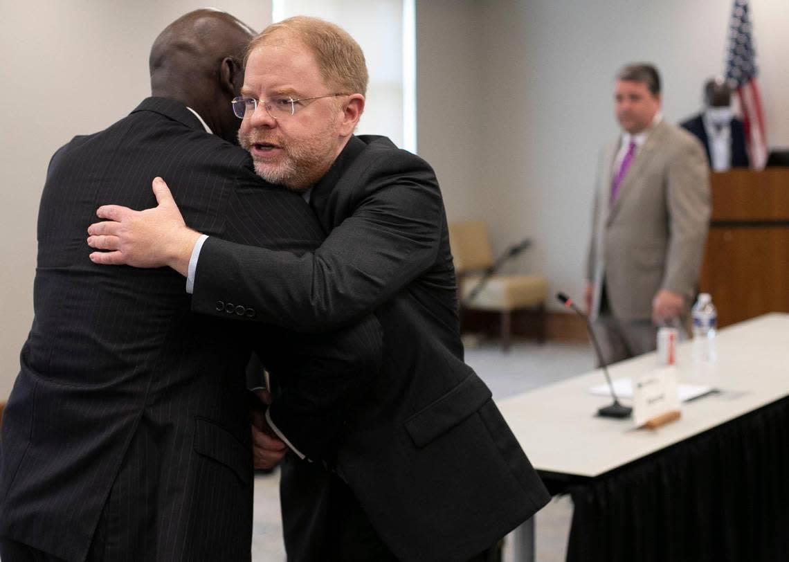 President-elect Peter Hans embraces Board of Governors member Reginald Holley following their meeting on Friday, June 19, 2020 in Chapel Hill, N.C.