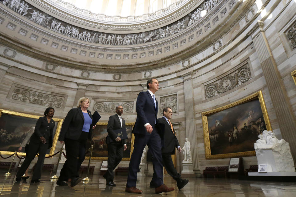 From left, Rep. Val Demings, D-Fla.; Rep. Rep. Zoe Lofgren, D-Calif.; Rep. Hakeem Jeffries, D-N.Y.; House Intelligence Committee Chairman Adam Schiff, D-Calif., and House Judiciary Committee Chairman, Rep. Jerrold Nadler, D-N.Y., walk through Capitol Hill in Washington, Thursday, Jan. 16, 2020, to deliver articles of impeachment to the Senate. (AP Photo/Julio Cortez)