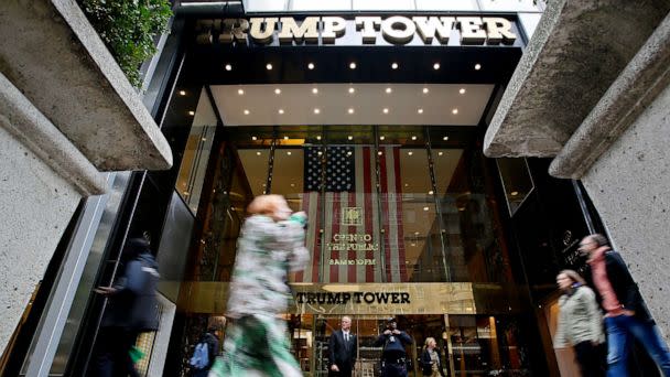 PHOTO: People make their way past the Trump Tower, Oct. 24, 2022, in New York. (View Press/Corbis via Getty Images)