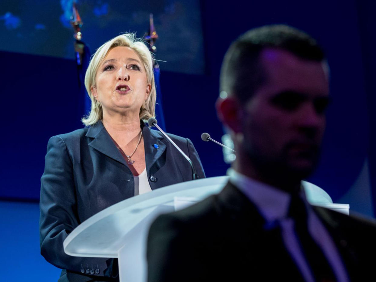 A triumphant Marine Le Pen addresses her supporters in northern France on Sunday: Getty