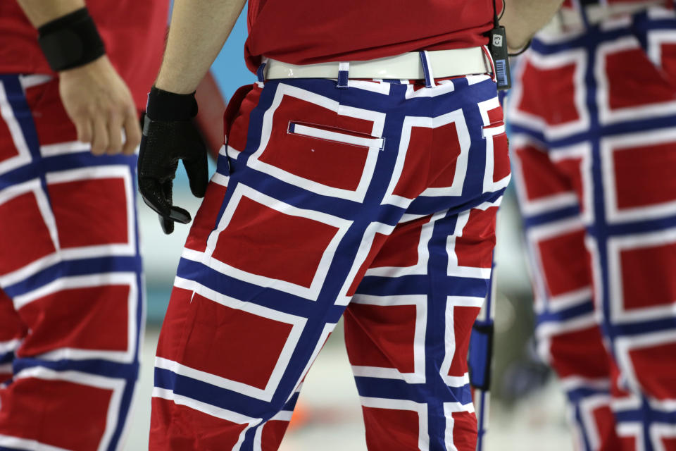 The Norway curling team’s latest pants design, inspired by the country’s flag, are seen during competition at the 2014 Winter Olympics, Thursday, Feb. 13, 2014, in Sochi, Russia. (AP)