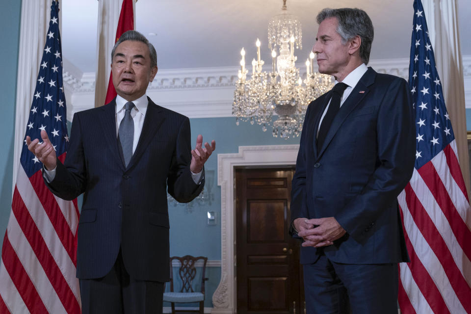 Secretary of State Antony Blinken listens as China's Foreign Minister Wang Yi speaks after a bilateral meeting at the State Department in Washington, Thursday, Oct. 26, 2023. (AP Photo/Jose Luis Magana)