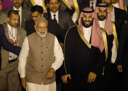 Saudi Arabia's Crown Prince Mohammed bin Salman and India's Prime Minister Narendra Modi pose for a picture after Salman's arrival at an airport in New Delhi, India, February 19, 2019. REUTERS/Adnan Abidi