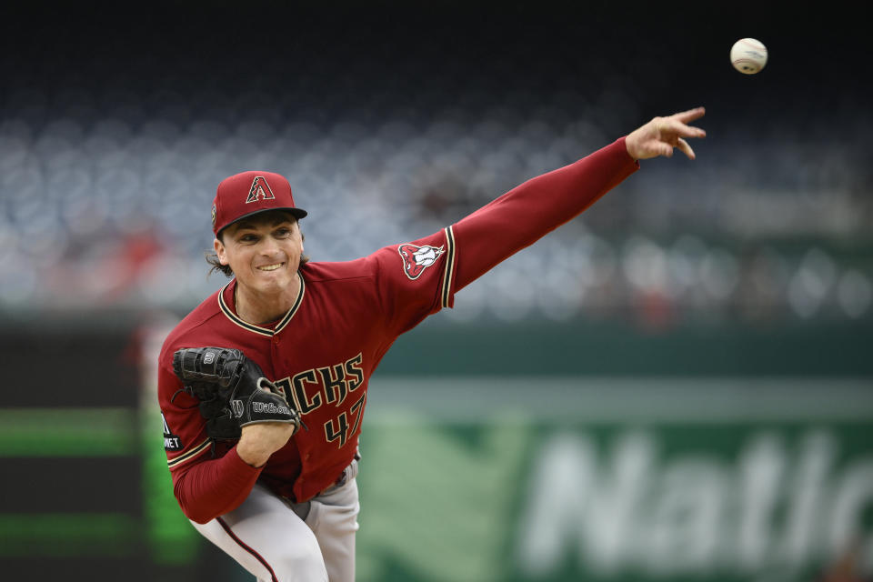 Arizona Diamondbacks starting pitcher Tommy Henry throws during the first inning of a baseball game against the Washington Nationals, Thursday, June 22, 2023, in Washington. (AP Photo/Nick Wass)