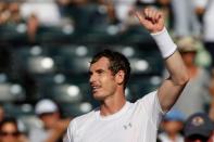 Apr 1, 2015; Key Biscayne, FL, USA; Andy Murray waves to the crowd after his match against Dominic Thiem (not pictured) on day ten of the Miami Open at Crandon Park Tennis Center. Murray won 3-6, 6-4, 6-1. Mandatory Credit: Geoff Burke-USA TODAY