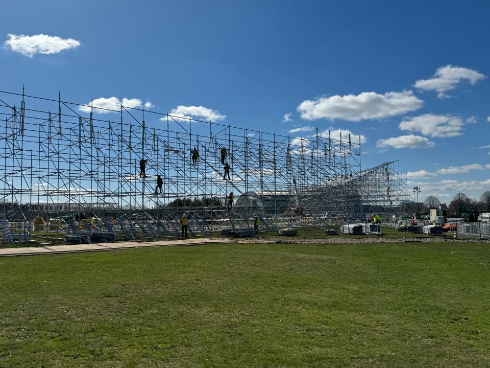 Construction workers work the beams on March 19, 2024, at the Nassau County Cricket Stadium on Long Island, New York. The stadium is expected to be complete by mid-May.