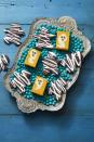 <p>Your gingerbread man cookie cutter isn't just for Christmas — use it to make these creepy cookies, too.</p><p><a href="https://www.womansday.com/food-recipes/a33563511/double-chocolate-mummies-recipe/" rel="nofollow noopener" target="_blank" data-ylk="slk:Get the Double Chocolate Mummies recipe.;elm:context_link;itc:0;sec:content-canvas" class="link "><strong><em>Get the Double Chocolate Mummies recipe.</em></strong></a></p>