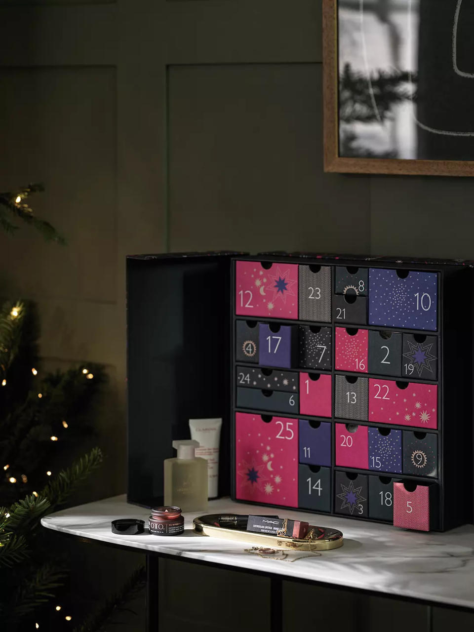 John Lewis' 2022 advent calendar is filled with 27 full and deluxe-size products, featuring full-size favourites from Olaplex, Charlotte Tilbury and Sunday Riley. (John Lewis & Partners) 