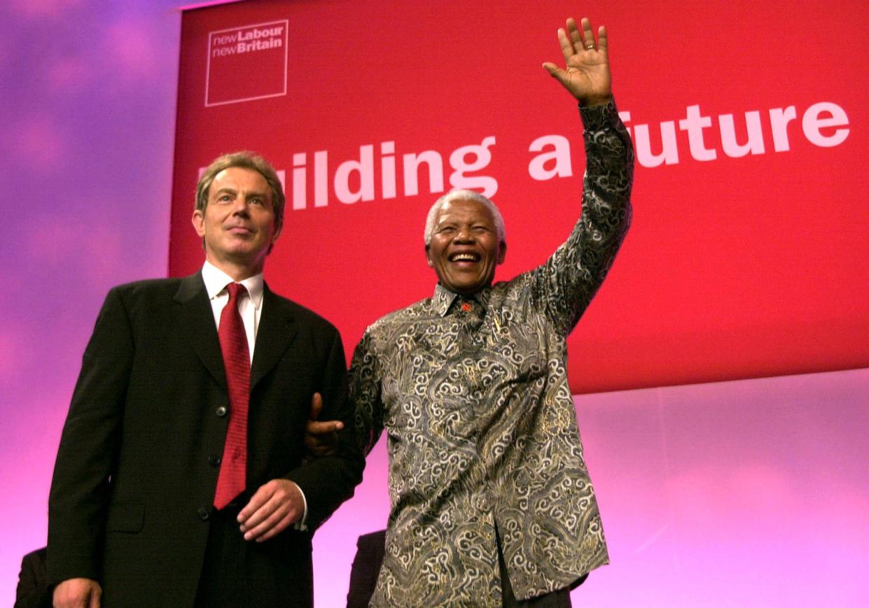 The late Nelson Mandelawith then Prime MInister Tony Blair at the Labour Party Conference in 2000 (PA)